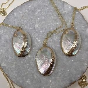 Estrella And Luna Gold Shell Pendant